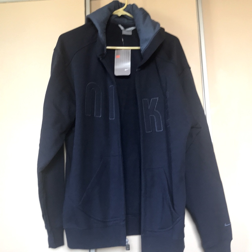 Navy Nike hoodie jacket.